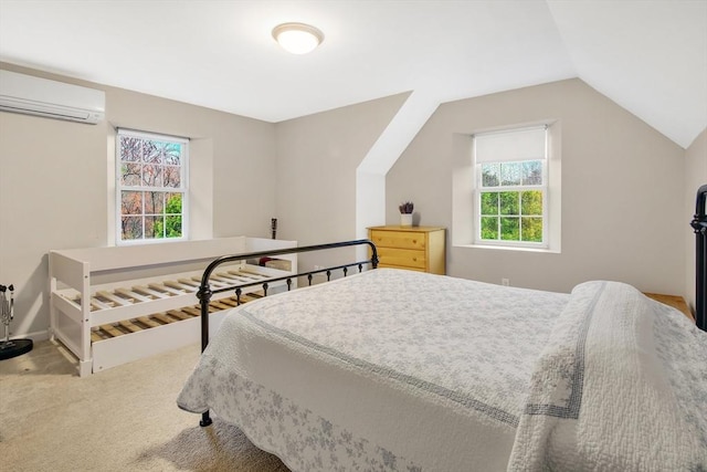 bedroom with vaulted ceiling, light colored carpet, and an AC wall unit