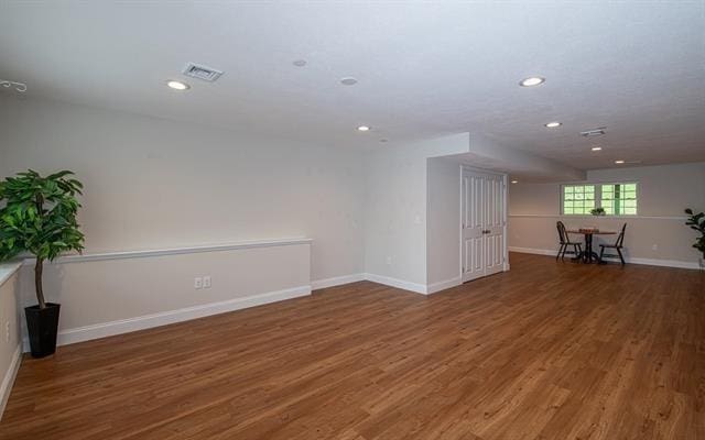 41 Winchester Unit 0, Hampstead, NH 03826 - empty room with wood finished floors, recessed lighting, and baseboards