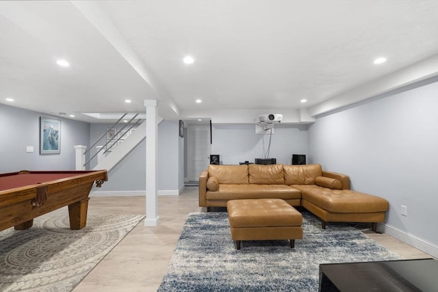 living room with baseboards, recessed lighting, and stairs