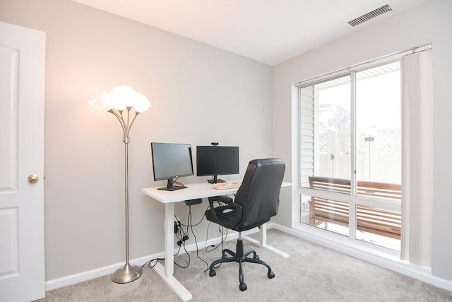 office space featuring light colored carpet