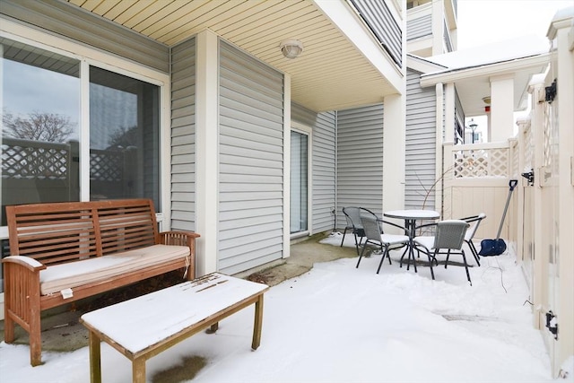 view of snow covered patio