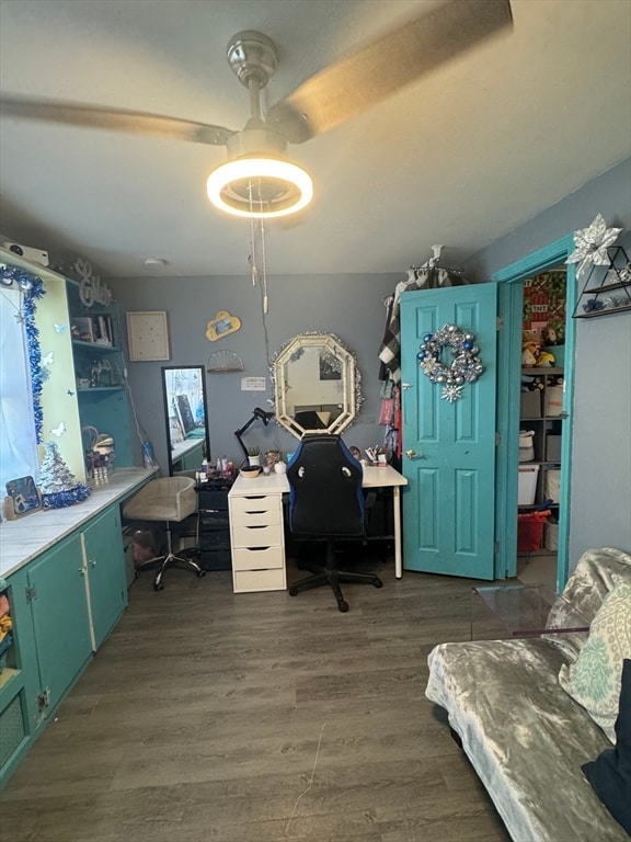 office featuring dark hardwood / wood-style flooring and ceiling fan