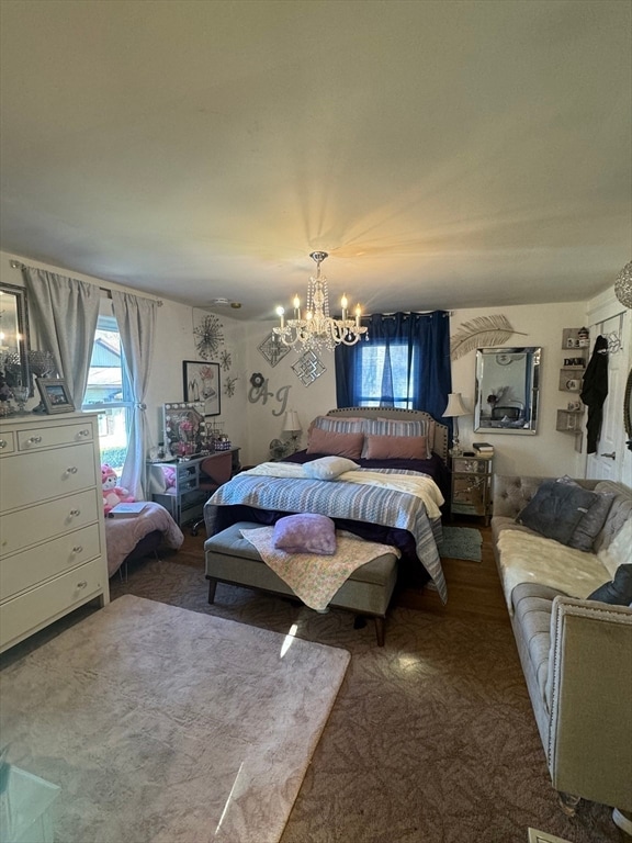 bedroom with an inviting chandelier