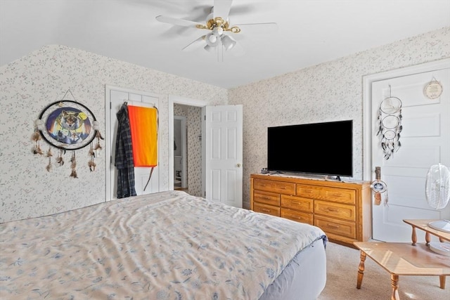 bedroom featuring wallpapered walls, carpet flooring, and ceiling fan