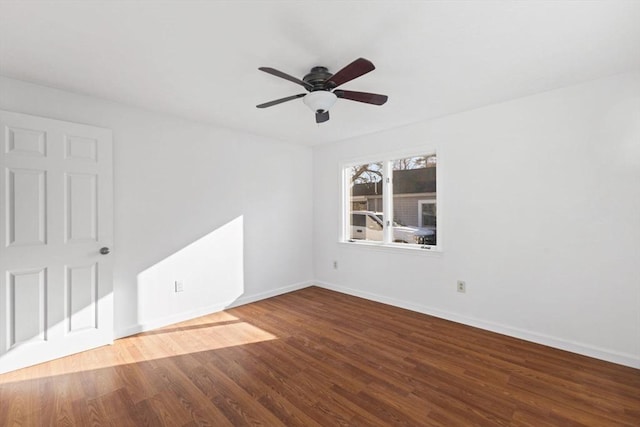 unfurnished room featuring hardwood / wood-style flooring and ceiling fan