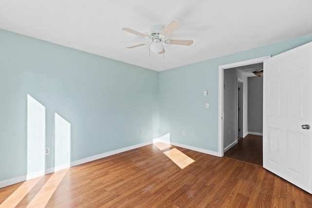 unfurnished room featuring wood-type flooring and ceiling fan