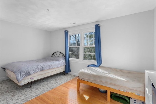 bedroom featuring hardwood / wood-style floors