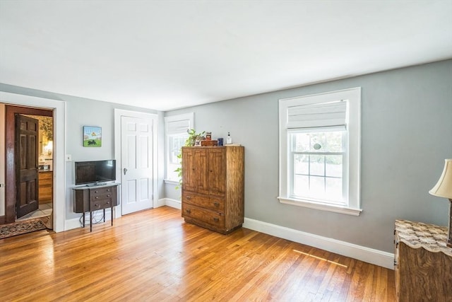 22 Sycamore Rd, Weymouth, MA 02190 - bedroom featuring light wood-type flooring and baseboards