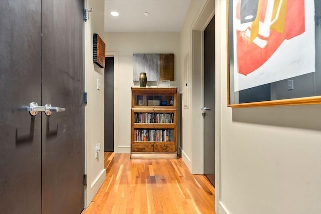 2400 Beacon St Unit 203, Boston, MA 02467 - hall featuring wood finished floors, baseboards, and recessed lighting