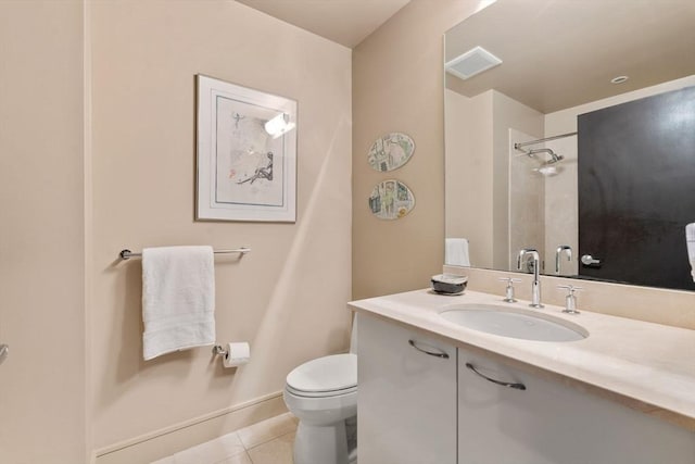 2400 Beacon St Unit 203, Boston, MA 02467 - full bath with tile patterned floors, toilet, vanity, a shower, and baseboards
