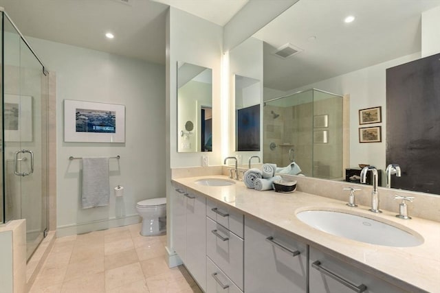 2400 Beacon St Unit 203, Boston, MA 02467 - full bathroom featuring double vanity, a stall shower, toilet, tile patterned floors, and recessed lighting