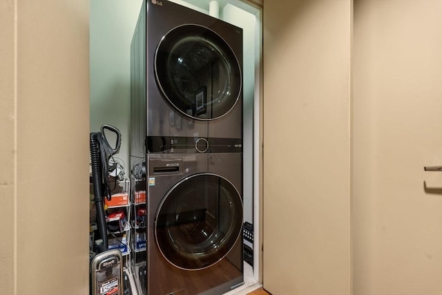 2400 Beacon St Unit 203, Boston, MA 02467 - washroom featuring stacked washer / dryer