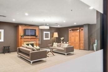 2400 Beacon St Unit 203, Boston, MA 02467 - living area featuring recessed lighting and light colored carpet