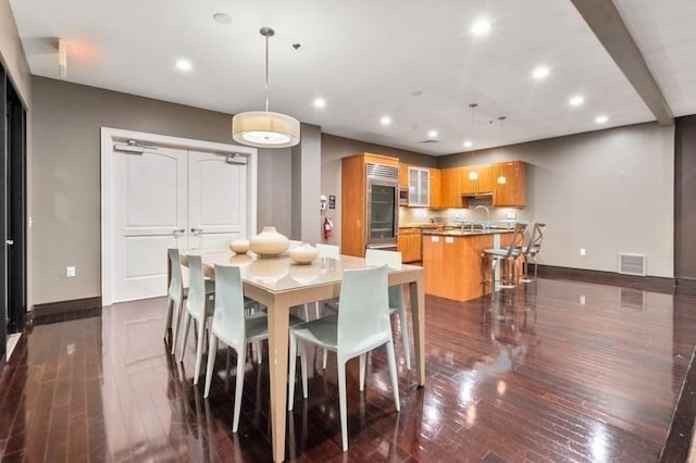 2400 Beacon St Unit 203, Boston, MA 02467 - dining space with baseboards, recessed lighting, and dark wood finished floors