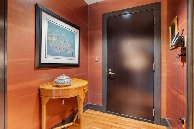 2400 Beacon St Unit 203, Boston, MA 02467 - doorway to outside featuring wood finished floors