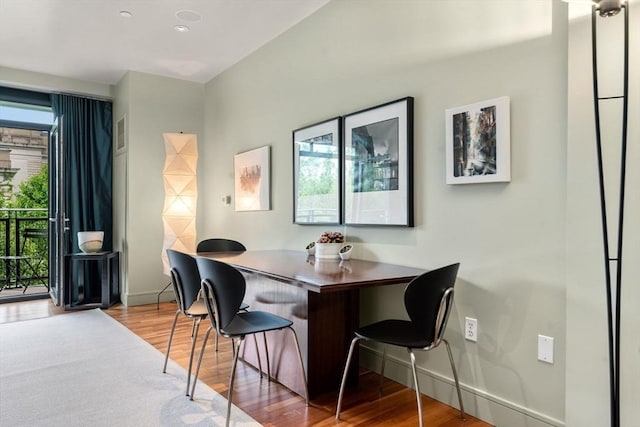 2400 Beacon St Unit 203, Boston, MA 02467 - dining space featuring wood finished floors and baseboards
