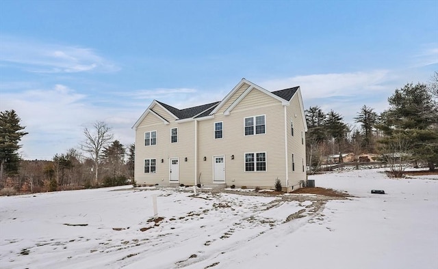 view of snow covered house