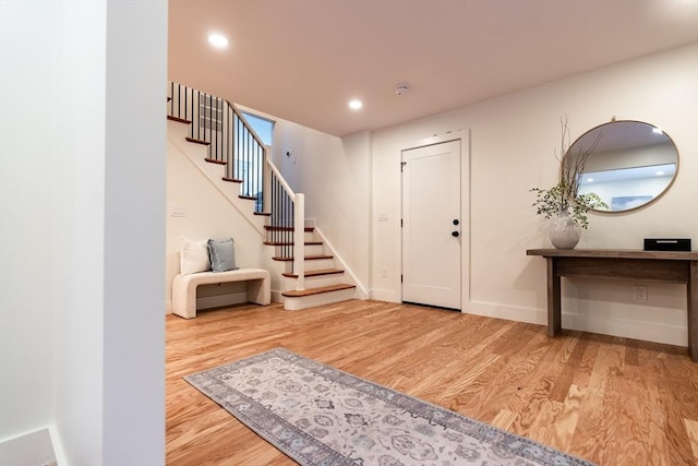 foyer entrance featuring hardwood / wood-style flooring