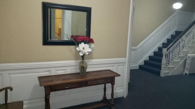 501 Beacon St Unit 1, Boston, MA 02215 - interior space with stairs, wainscoting, carpet flooring, and a decorative wall