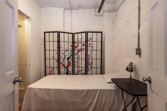 501 Beacon St Unit 1, Boston, MA 02215 - bedroom featuring brick wall