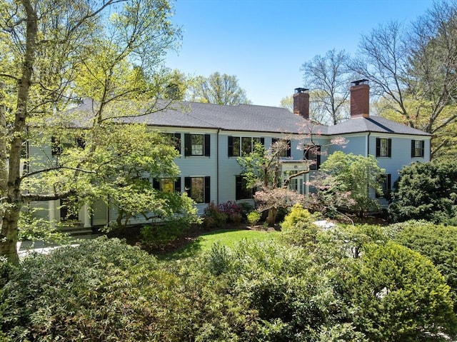view of front of house with a chimney