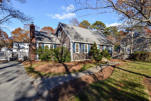 exterior space with a front yard