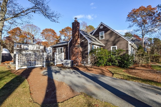 view of front of home featuring central AC unit