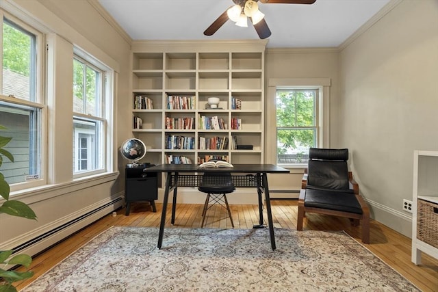 181 Lowell St, Andover, MA 01810 - office with hardwood / wood-style flooring, baseboard heating, ornamental molding, and a ceiling fan