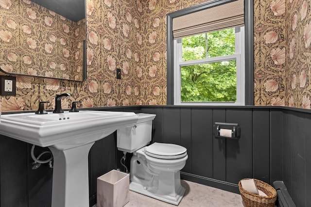 181 Lowell St, Andover, MA 01810 - half bath featuring wallpapered walls, baseboard heating, wainscoting, and toilet