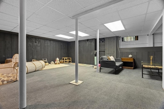 181 Lowell St, Andover, MA 01810 - finished below grade area featuring carpet floors, a paneled ceiling, and wooden walls
