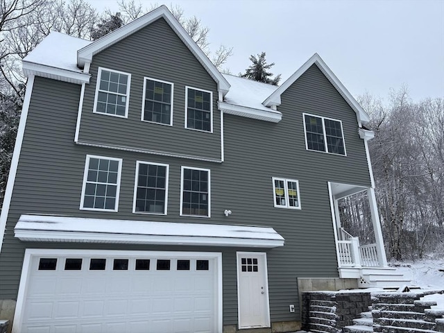 view of front of property featuring a garage