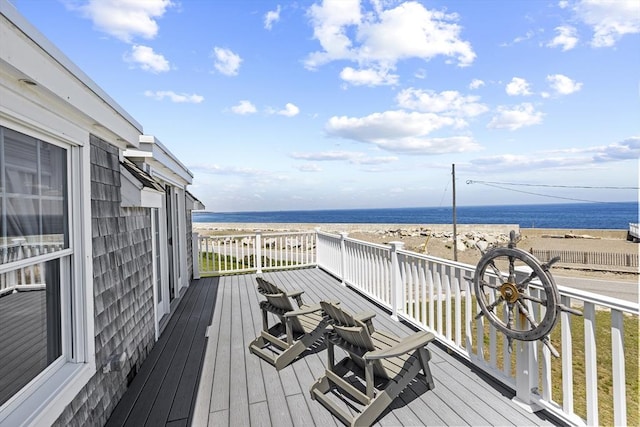 deck featuring a water view