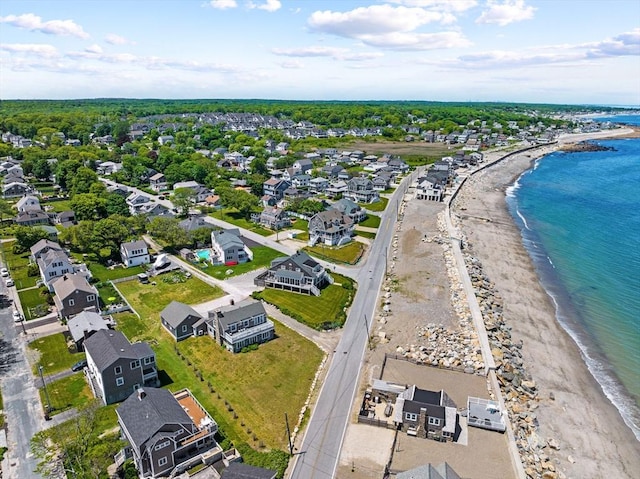 aerial view featuring a water view and a beach view