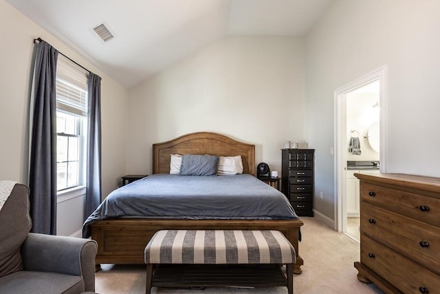 34 Bates St Unit 34, Abington, MA 02351 - bedroom with lofted ceiling, light colored carpet, and ensuite bathroom