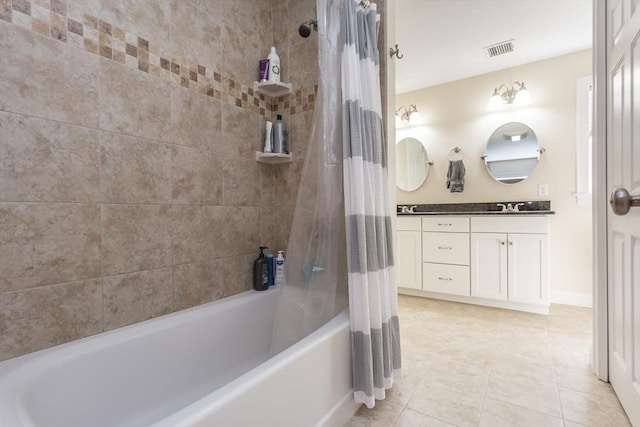 34 Bates St Unit 34, Abington, MA 02351 - bathroom featuring double vanity, shower / bath combo, tile patterned flooring, and baseboards