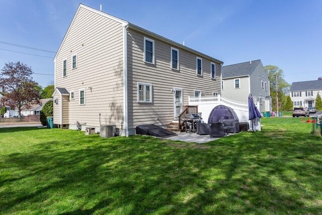 34 Bates St Unit 34, Abington, MA 02351 - back of house with a yard, central air condition unit, and a patio area
