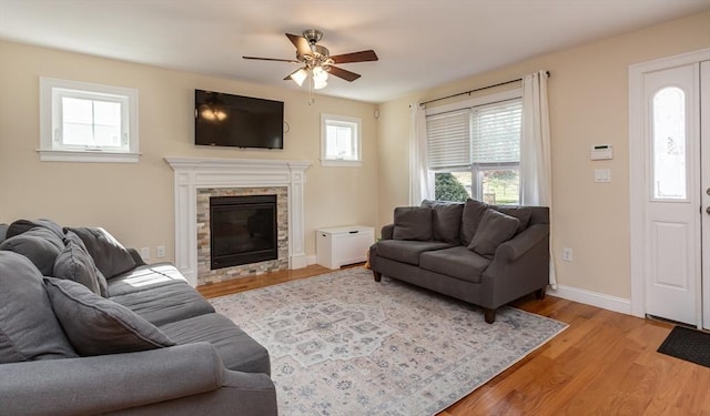 34 Bates St Unit 34, Abington, MA 02351 - living room with a ceiling fan, plenty of natural light, light wood-type flooring, and baseboards
