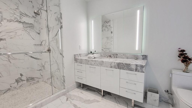 bathroom featuring toilet, vanity, and an enclosed shower