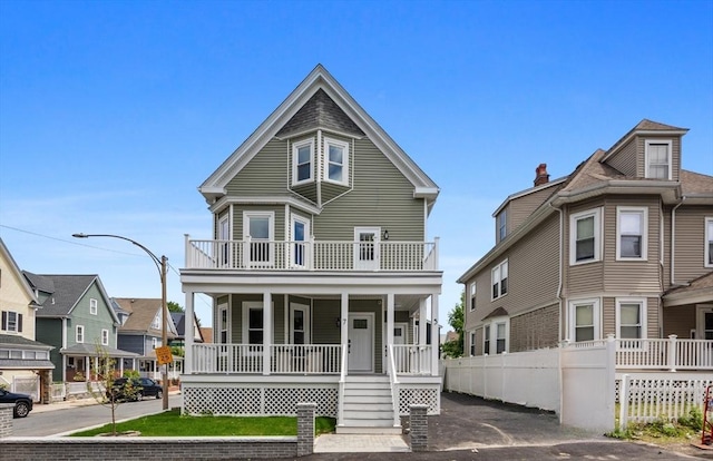 7 Denvir St Unit 2, Boston, MA 02124 - view of front of home with covered porch and a balcony
