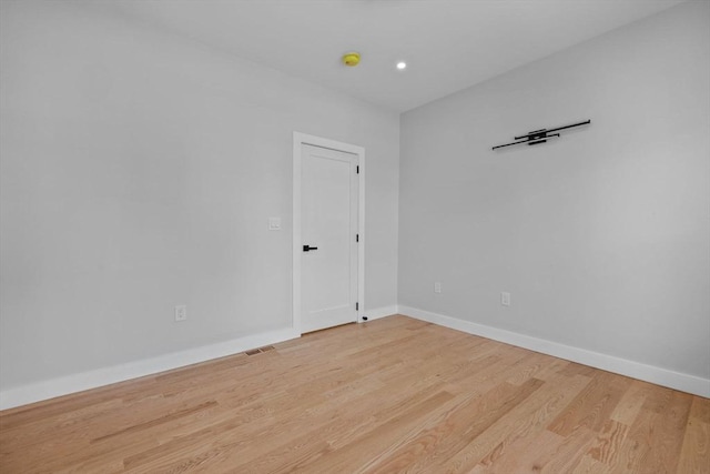 7 Denvir St Unit 2, Boston, MA 02124 - empty room featuring wood finished floors, baseboards, and recessed lighting