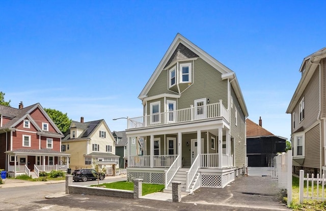 7 Denvir St Unit 2, Boston, MA 02124 - victorian-style house with a porch, a balcony, and a residential view