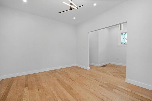7 Denvir St Unit 2, Boston, MA 02124 - empty room with baseboards, wood finished floors, recessed lighting, and a chandelier