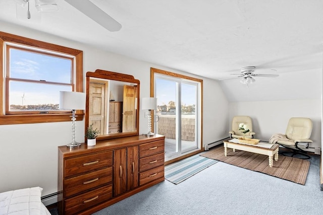 bedroom featuring access to outside, a ceiling fan, vaulted ceiling, and carpet flooring