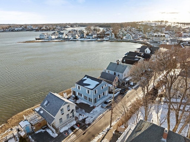 bird's eye view with a residential view and a water view