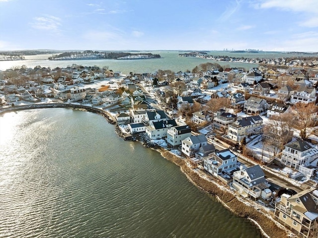 bird's eye view with a residential view and a water view