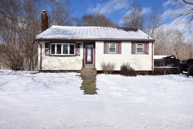 view of front of property featuring a chimney