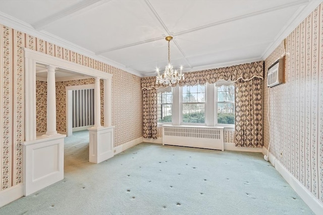 empty room featuring carpet, decorative columns, radiator heating unit, and wallpapered walls