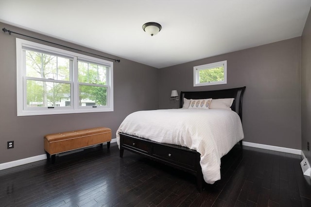 286 Narrow Ave, Westport, MA 02790 - bedroom with baseboards, multiple windows, and dark wood-type flooring