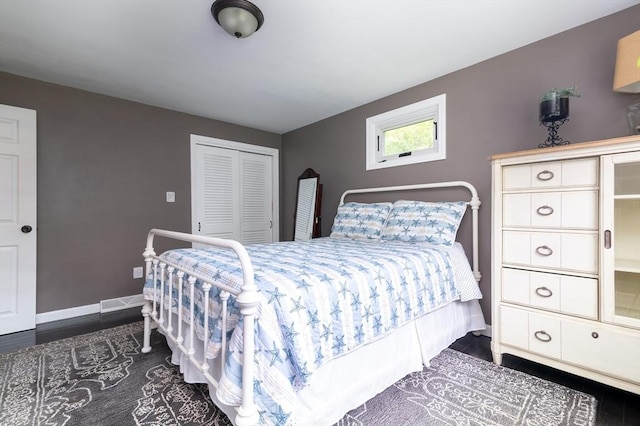286 Narrow Ave, Westport, MA 02790 - bedroom with baseboards, a closet, and dark wood-type flooring