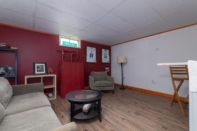 286 Narrow Ave, Westport, MA 02790 - living area featuring wood finished floors, a paneled ceiling, and baseboards